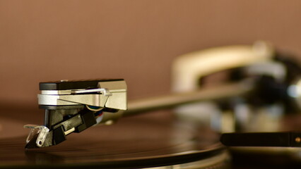Fototapeta na wymiar Needle of a classic vinyl player detail