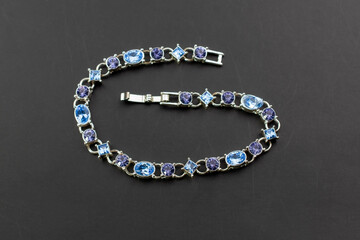 Dainty blue crystal bracelet, unique vintage jewelry background, rhinestone jewelry concept, promotional photo for an online jewellery store