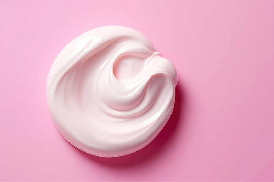 Top view of a smear of white thick cream isolated on a flat pink background surface with copy space. Cosmetic cream swirl, white paint. Generative AI professional photo imitation.