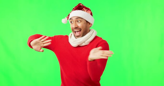 Christmas dance, man and green screen with hat feeling happy for promotion, deal or holiday sale. Isolated, studio background and person funny dancing for crazy, celebration and festive winter