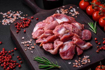 Raw chicken or turkey gizzards with salt, spices and herbs © chernikovatv