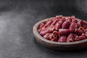 Raw chicken or turkey hearts with salt, spices and herbs