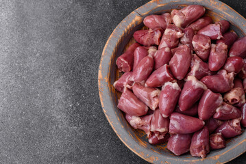 Raw chicken or turkey hearts with salt, spices and herbs