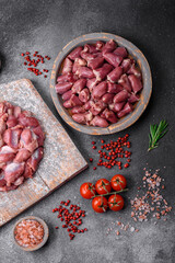 Raw chicken or turkey gizzards with salt, spices and herbs