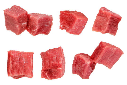 Pieces of raw beef. Set of fresh beef cubes isolated on white background. Isolate of beef cubes to insert into a design, project or for an advertising banner.