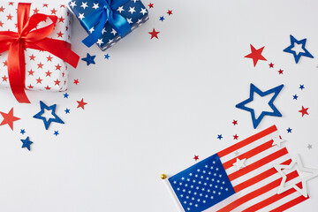 American Independence Day gift ideas. Top view flat lay of gift boxes, national flag, star-shaped...