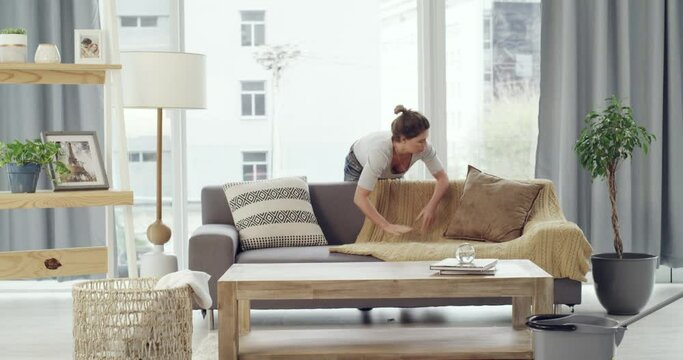 Woman, living room and cleaning house in timelapse for laundry, mop floor or organize fabric. Girl, apartment lounge or spring clean on sofa, pillow or fast housekeeping for order, hygiene or routine