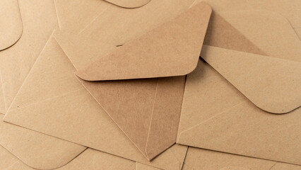 Post kraft paper envelopes background. Brown envelopes pattern in retro style