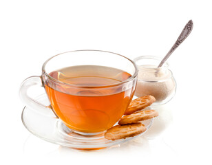Cup of tea with cookies and sugar on a white background.