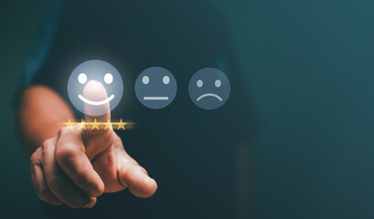 Customer satisfaction and service quality survey, Businessman pointing a smiley face icon to assess satisfaction with product and services on a virtual screen, highest level, positive feedback.