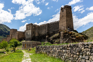 Fototapeta na wymiar Khertvisi Fortress, Georgia, stone medieval castle with watchtowers and citadel on a green rocky hill in Lesser Caucasus mountains in Samtskhe - Javakheti (Meskheti) region.
