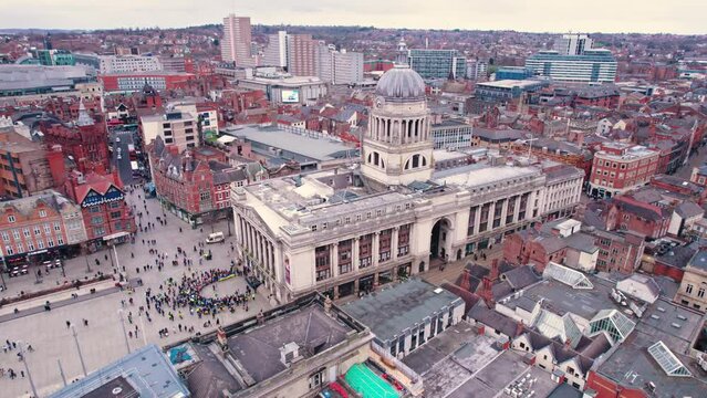 28.02.2023. Nottingham, United Kingdom. aerial panorama of people gathering in Nottingham Old Market Square. High quality 4k footage