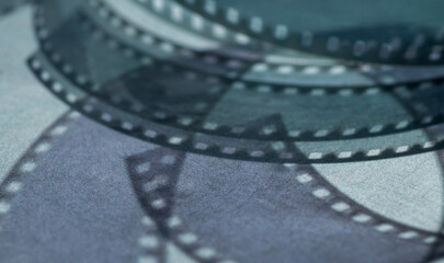 background with film strip.abstract background with shadows from film strip on gray surface for banner background