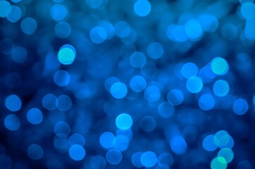 Blue abstract background. Blurred and glowing blue lights.