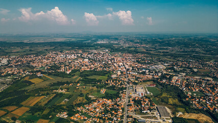 Areal drone footage of a suburb small town with private houses