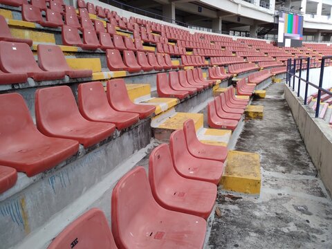 red chairs in stadium stands