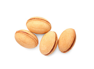 Delicious nut shaped cookies with boiled condensed milk on white background, top view