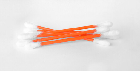 Heap of clean cotton buds on white background