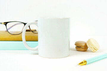 Coffee mug tea cup product mock up, in styled minimalist desktop workspace setting.