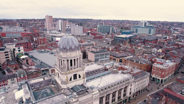 28.02.2023. Nottingham, United Kingdom. people gathered in the city center protesting Russia's invasion in Ukraine, aerial shot. High quality 4k footage