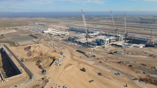 Aerial drone rotation view of the construction site of the new Western Sydney International Airport at Badgerys Creek in Western Sydney, NSW, Australia looking from the east side in June 2023    