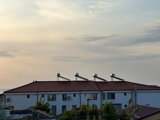 solar panels for water heating. solar water heater boiler on rooftop.