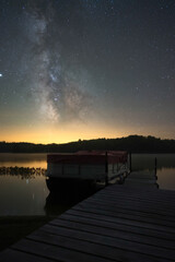 Milky Way Rising Over A Pontoon Boat In North America