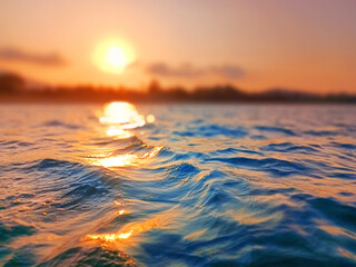 Sea wave splash, sunset blurred bokeh background, ocean water surf ripple texture, sunrise soft...