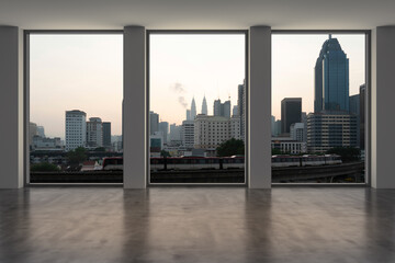 Obraz na płótnie Canvas Empty room Interior Skyscrapers View Malaysia.Downtown Kuala Lumpur City Skyline Buildings from High Rise Window. Beautiful Expensive Real Estate overlooking. Sunset. 3d rendering.