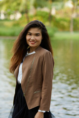 Vietnamese woman in the park during lunchtime in Vietnam. 