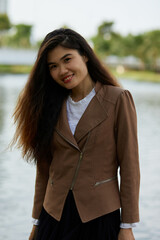 Vietnamese woman in the park during lunchtime in Vietnam. 