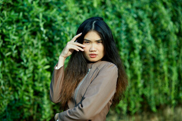 Vietnamese woman in the park during lunchtime in Vietnam. 