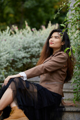 Vietnamese woman in the park during lunchtime in Vietnam. 