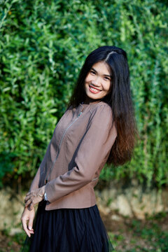 Vietnamese woman in the park during lunchtime in Vietnam. 