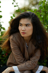 Vietnamese woman in the park during lunchtime in Vietnam.