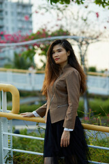 Vietnamese woman in the park during lunchtime in Vietnam.