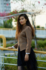 Vietnamese woman in the park during lunchtime in Vietnam.