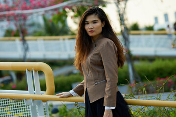 Vietnamese woman in the park during lunchtime in Vietnam.