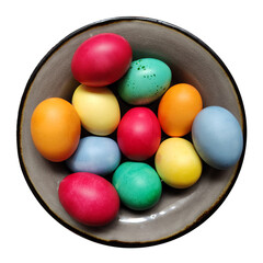 Merry dyed multicolored Easter eggs lying on a plate. Spring seasonal religious symbol of resurrection and renewal. Orthodox Christian tradition. Ethnic folk custom.