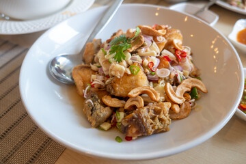 Ready to eat Fried Snapper Fish in Spicy Herb Salad Thai food