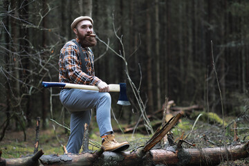 A bearded lumberjack with a large ax