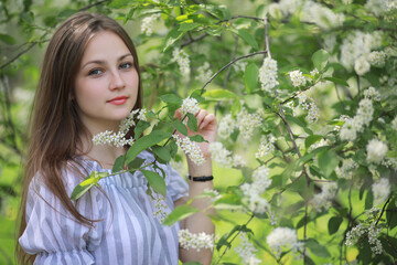 A girl in a spring green park