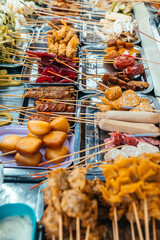 different kind of food is displayed at market stall