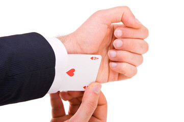 businessman with ace card hidden under sleeve
