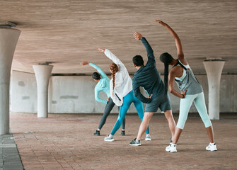 Fototapeta premium Group, workout and team stretching as a fitness club for sports, health and wellness in a class together. Sport, commitment and friends training or people doing pilates exercise or yoga as teamwork