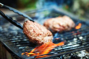 hamburgers on outdoor grill