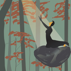 woman is praying or meditating in the autumn forest