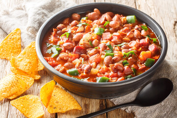 Mexican Charro Beans made with pinto beans, bacon, ham, chorizo, chili peppers, tomatoes and spices...