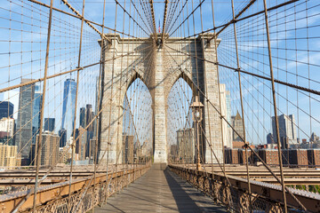 Brooklyn Bridge in New York City skyline of Manhattan with World Trade Center skyscraper in the United States