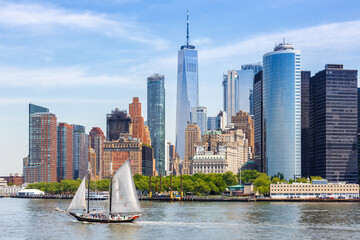 New York City skyline of Manhattan with World Trade Center skyscraper and sailing ship in the...